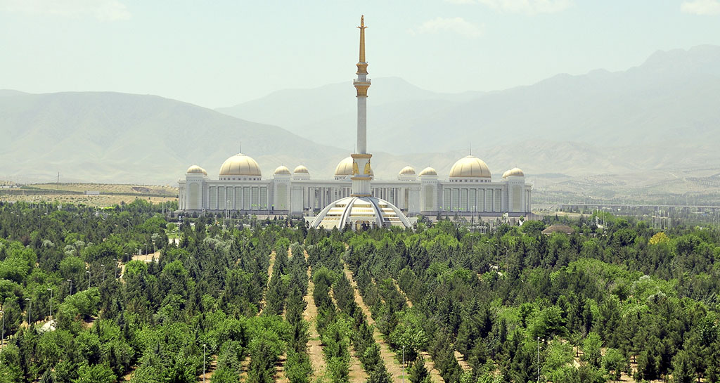 “… A big shadowy garden against the background of high mountains”