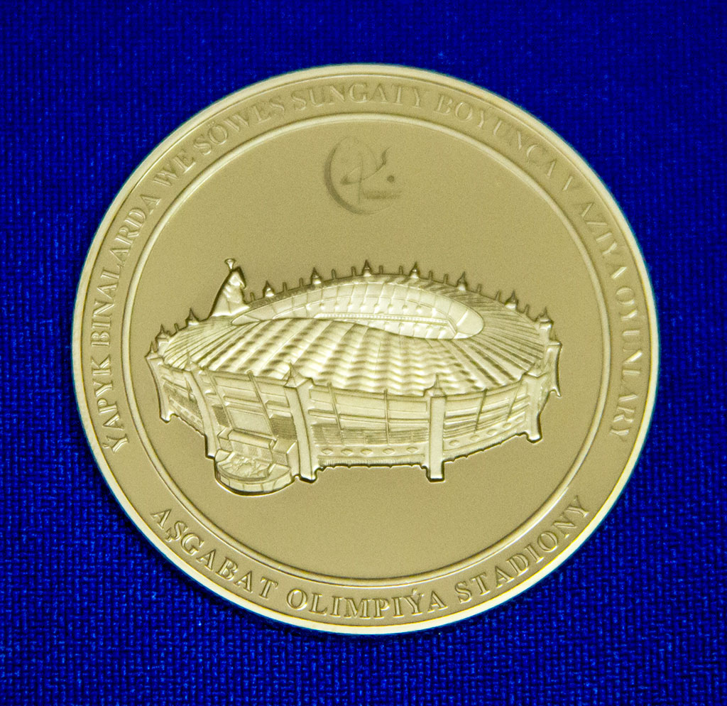 Commemorative coins and modified samples of banknotes dated to the 5th Asian indoor and martial arts games 